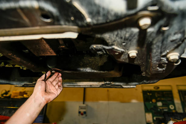 istock Oil change of a car engine 1414459680