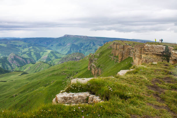 istock panoramic view of green mountains and hills blurred in morning 1414459980