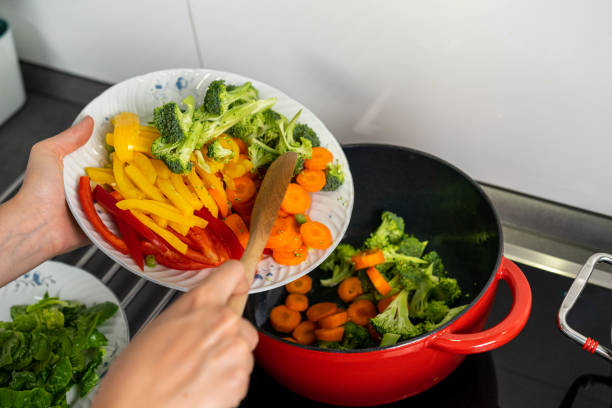 istock Vegetables on the plate are falling in the pot 1414461502