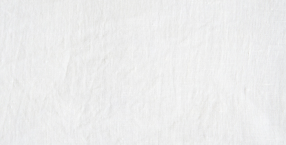 Photo of white fabric canvas. Fabric texture.
