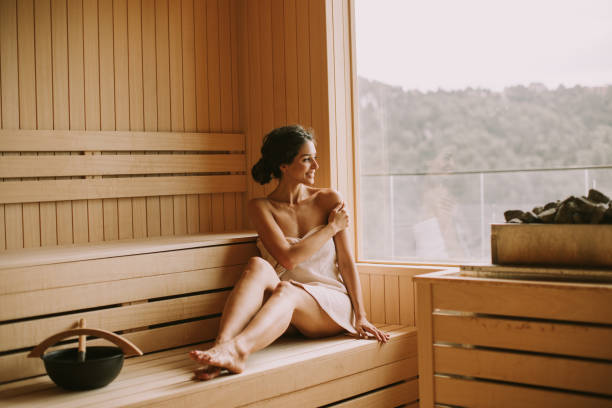 istock Young woman relaxing in the sauna 1414466344