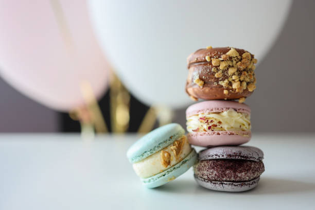 istock Macaroons close-up on a white table in a cafe 1414469541
