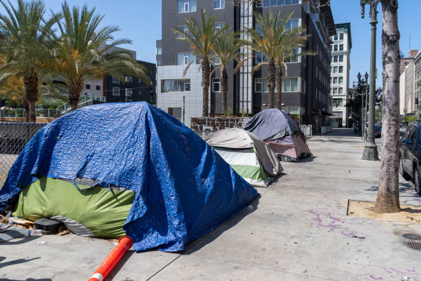 Homeless tents along the roadside in downtown Los Angeles, California, USA. stock photo