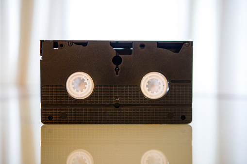 old cassette tape on a smooth surface