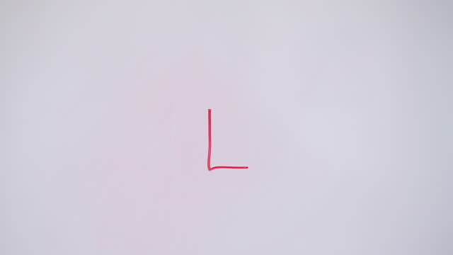 Hand Writing Lowercase Letter l On White Board With Red Marker