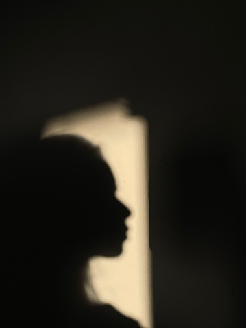 Sunshine silhouette of a woman at the time of dawn