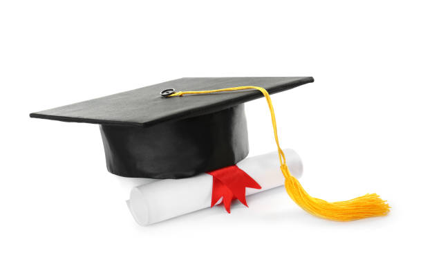 istock Graduation hat and diploma on white background 1414484144