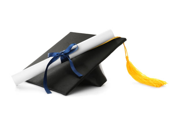 istock Graduation hat and diploma on white background 1414484788
