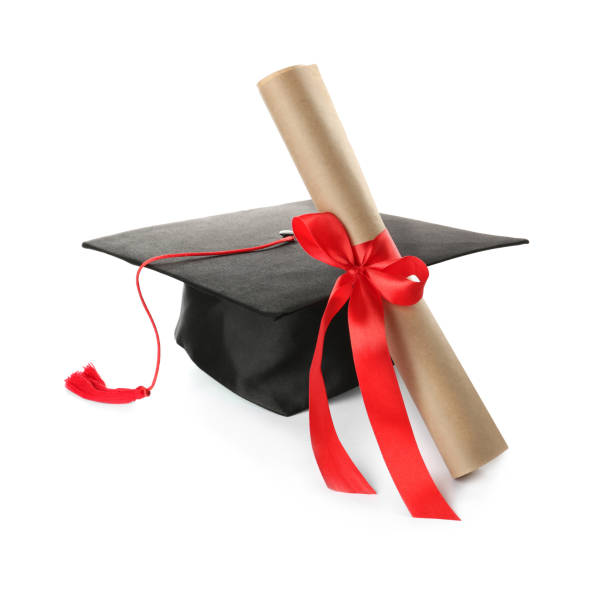 istock Graduation hat and diploma on white background 1414484876