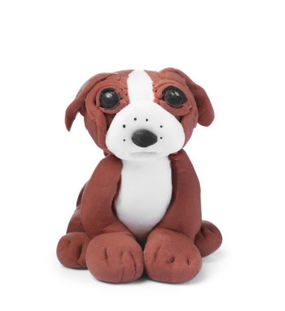 istock Small dog made from play dough on white background 1414485650