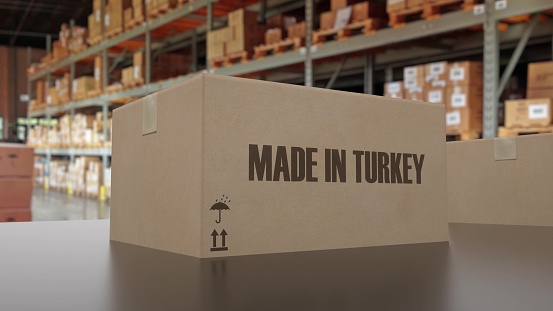 Boxes with MADE IN TURKEY text on conveyor. 3d illustration.