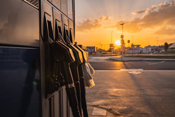 Petrol pump fuel nozzles at gas station