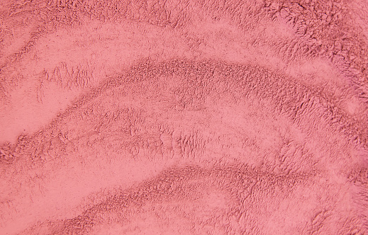 Cosmetic texture mask clay powder red. Selective focus.