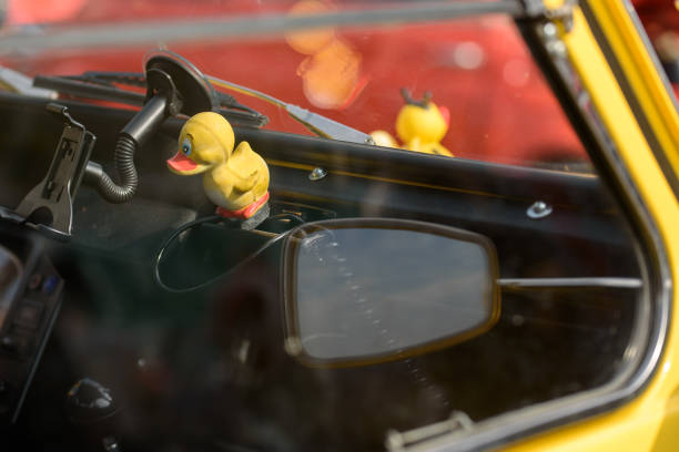 Close up details of Antique American Classic Cars create beautiful and colorful geometric designs.