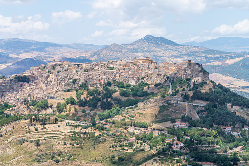 Sicilian landscapes with the amazing medieval stone town of Leonforte on the hill in the province of Enna