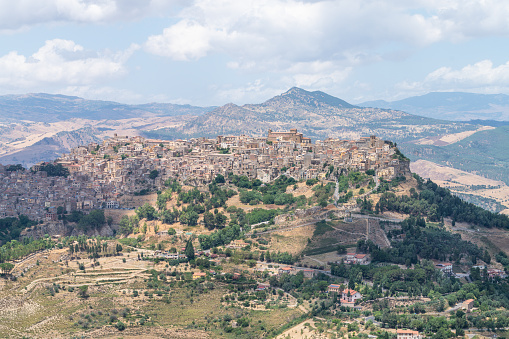 Sicilian landscapes with the amazing medieval stone town of Leonforte on the hill in the province of Enna