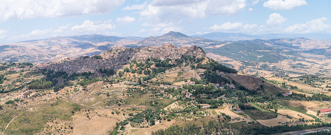 Sicilian landscapes with the amazing medieval stone town of Leonforte on the hill in the province of Enna