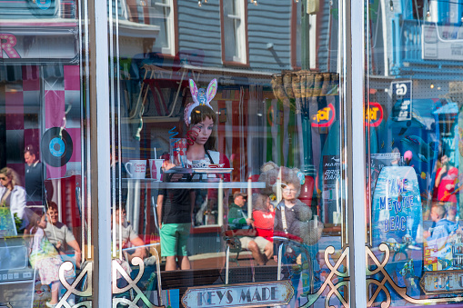 Cape May, USA - April 15, 2022. Store window display in Washington Street Mall in downtown Cape May, New Jersey, USA