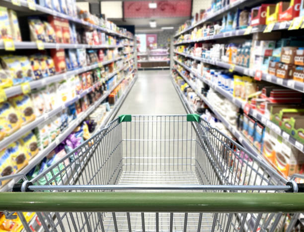 istock choosing a dairy products at supermarket. 1414494257