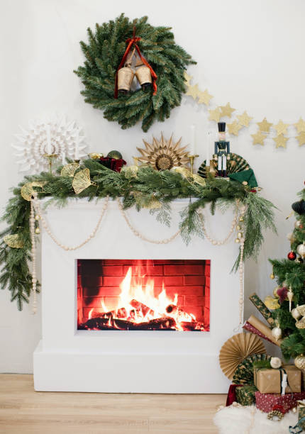 istock Christmas fireplace with golden vintage decorations 1414494402