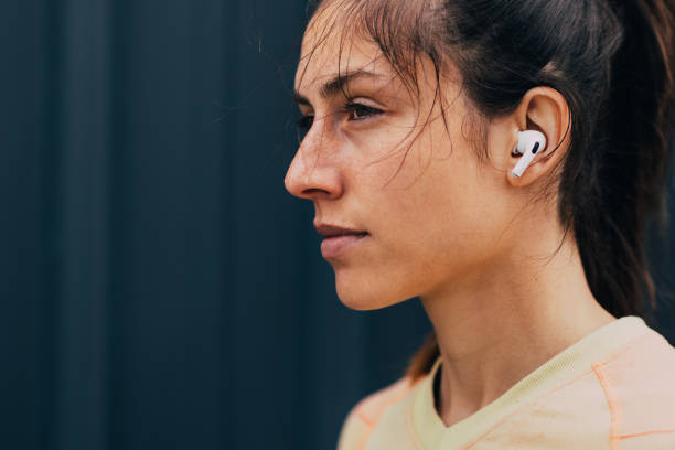 istock Sportswoman With Earplugs 1414498039