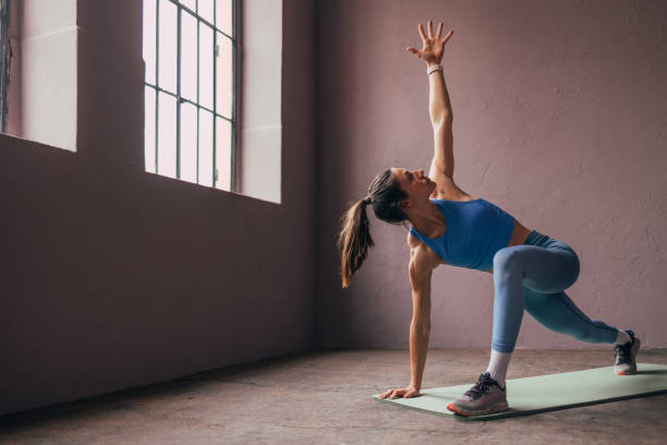 istock Woman Working Out In The Gym. 1414498092