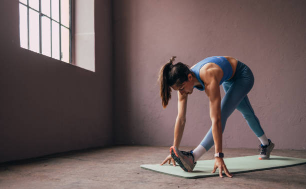 istock Woman Working Out In The Gym. 1414498094