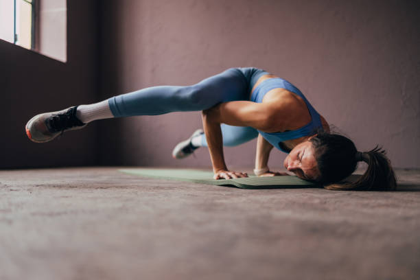 istock Woman Working Out In The Gym. 1414498104