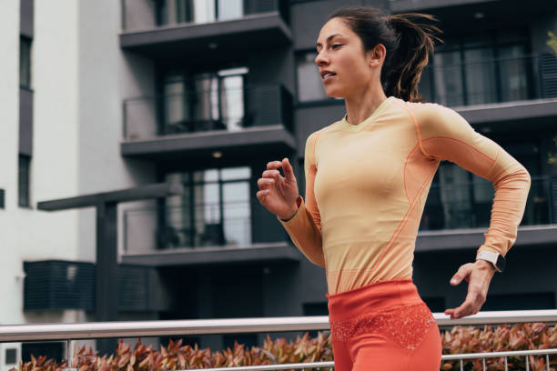 istock Woman Running Outdoors 1414498167