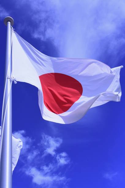 Japanese flag fluttering in the wind. stock photo