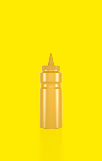 istock Squeeze Bottle Condiment Dispenser On Yellow Background 1414505113