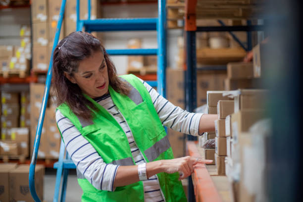 istock woman working in warehouse 1414509392