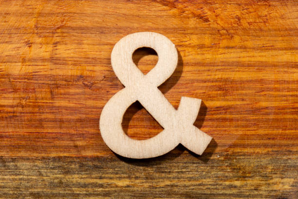 istock Character & on wooden background, top view 1414512902