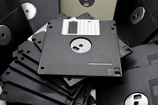 A pile of 3.5 inch floppy disks.