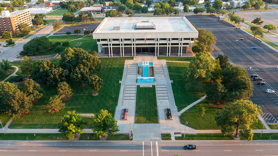 Kansas Judicial Center from a drone point of view, looking South at sunset. The Kansas Supreme Court and Kansas Appellate Court are located in this building in the Kansas state capitol city of Topeka, KS.