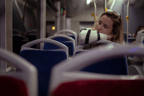 istock The woman is napping on the bus. 1414522839