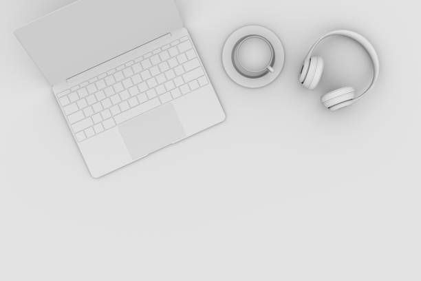 istock Top view desktop with Laptop, headphones, cup of coffee 3d rendering. 1414524779