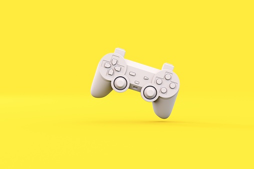 White gamepad on white uniform background. Minimalism. Copy space for text
