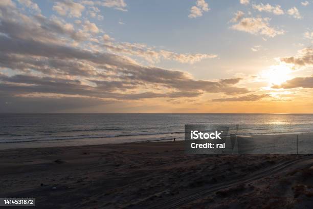 The Setting Sun Stock Photo - Download Image Now - Backgrounds, Beach, Beauty