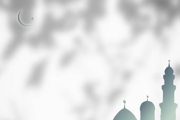 istock Mosques Dome and Moon on shadow plant leaves Background 1414535250