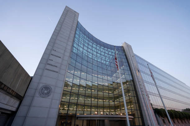 U.S. Securities and Exchange Commission (SEC) Building Washington, DC, USA - June 24, 2022: The U.S. Securities and Exchange Commission (SEC) headquarters in Washington, DC, at dusk. The primary purpose of the SEC is to enforce the law against market manipulation. authority stock pictures, royalty-free photos & images