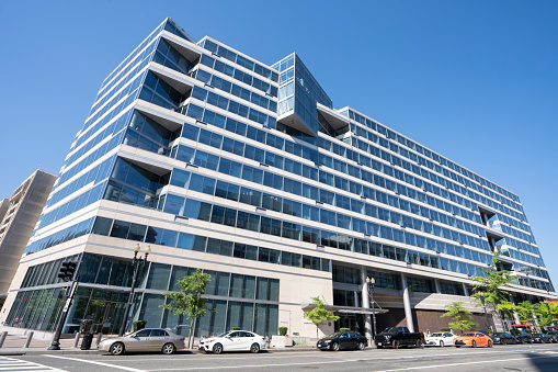 Washington, DC, USA - June 25, 2022: Front view of the International Monetary Fund (IMF) headquarters building in Washington, DC. IMF is a global financial institution under the United Nations.