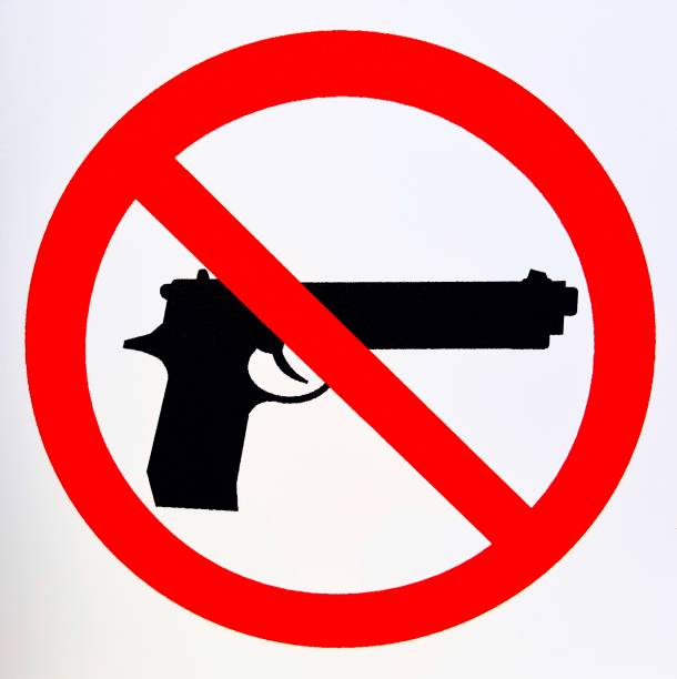 Firearms prohibited sign illustration on a white background. Firearms prohibited sign illustration on a white background. Gun control conceptual image. gun free zone sign stock pictures, royalty-free photos & images