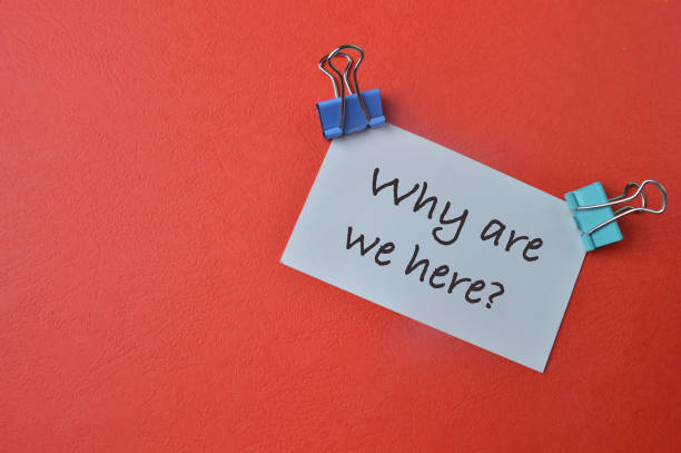 istock White paper written with question WHY ARE WE HERE? 1414546062