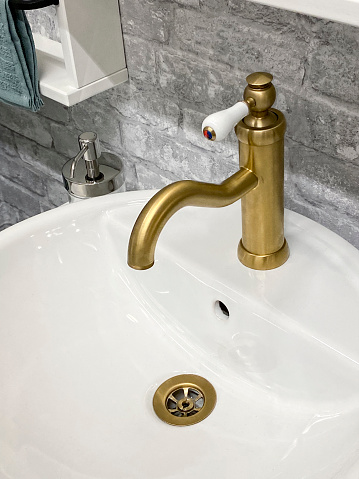 Chic sink and brass faucet