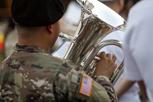 Bucharest, Romania - August 12, 2022: Shallow depth of field (selective focus) details with 101st Airborne Division Air Assault Band members performing in Bucharest during the Romanian Navy national day.