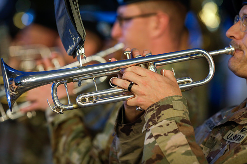 Bucharest, Romania - August 12, 2022: Shallow depth of field (selective focus) details with 101st Airborne Division Air Assault Band members performing in Bucharest during the Romanian Navy national day.