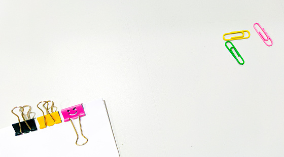 Colorful paper clip arrange beautifully for copy space
