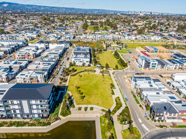 istock Aerial wide angle view, high angle looking down on green space in modern housing development 1414559567
