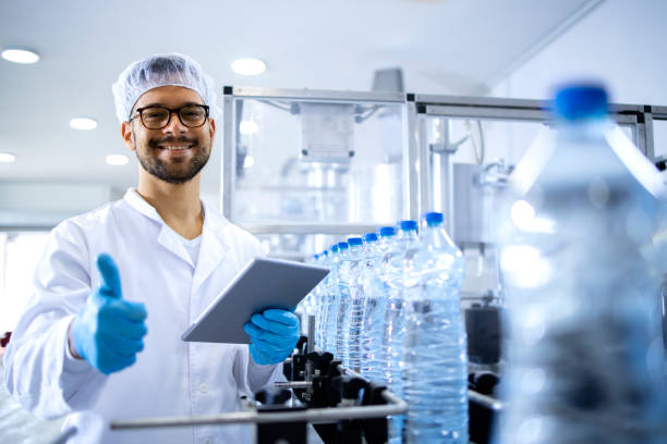 istock Technologist in water bottling plant. 1414566221